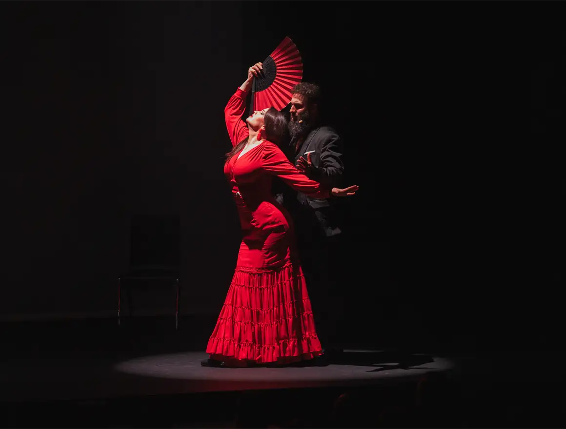 A woman dancing flamenco at the Authentic Flamenco show in NYC
